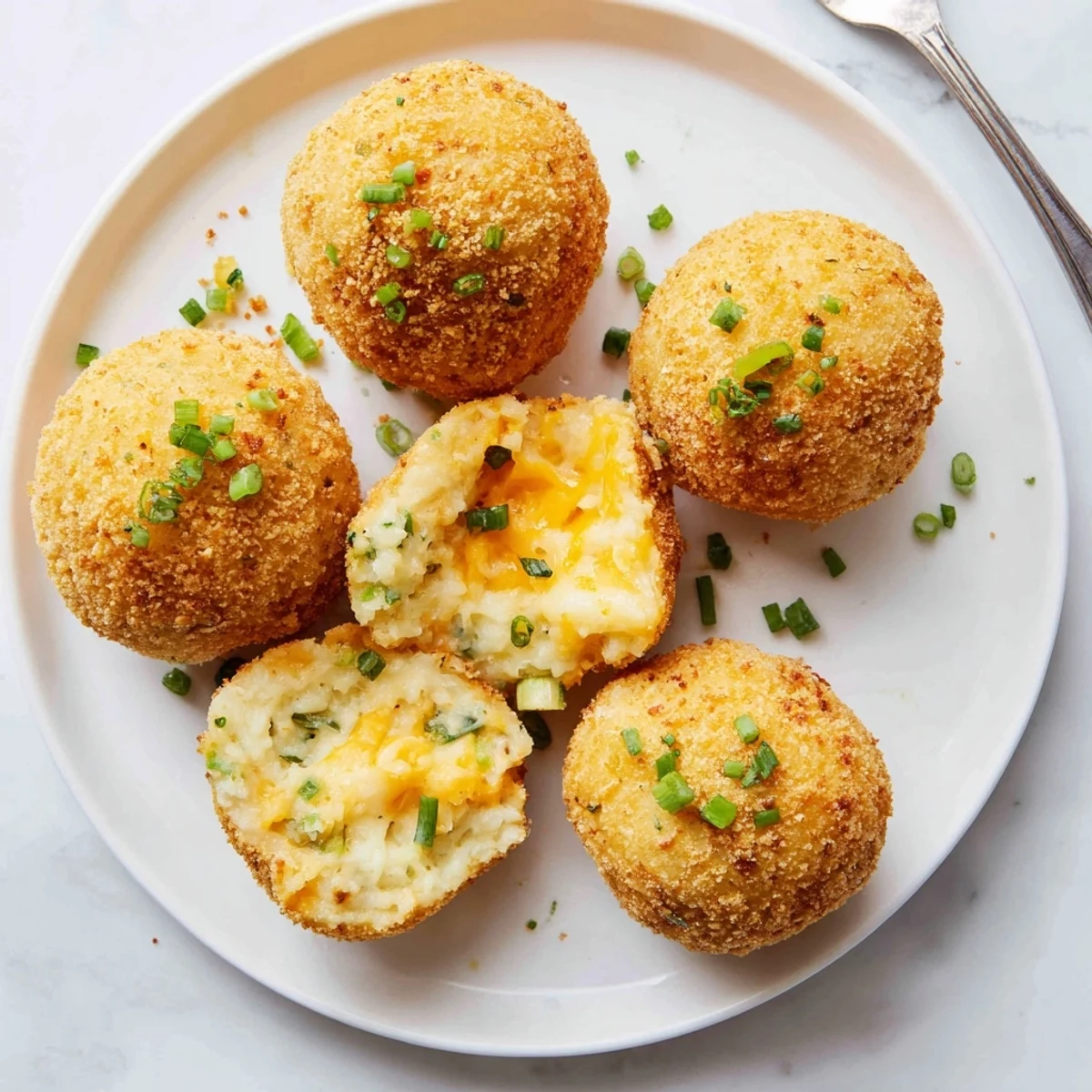Crispy golden Fried Mashed Potato Balls served hot with creamy ranch dip